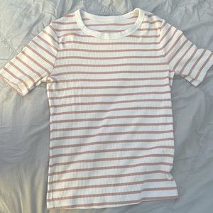 size medium striped shirt. fits tight